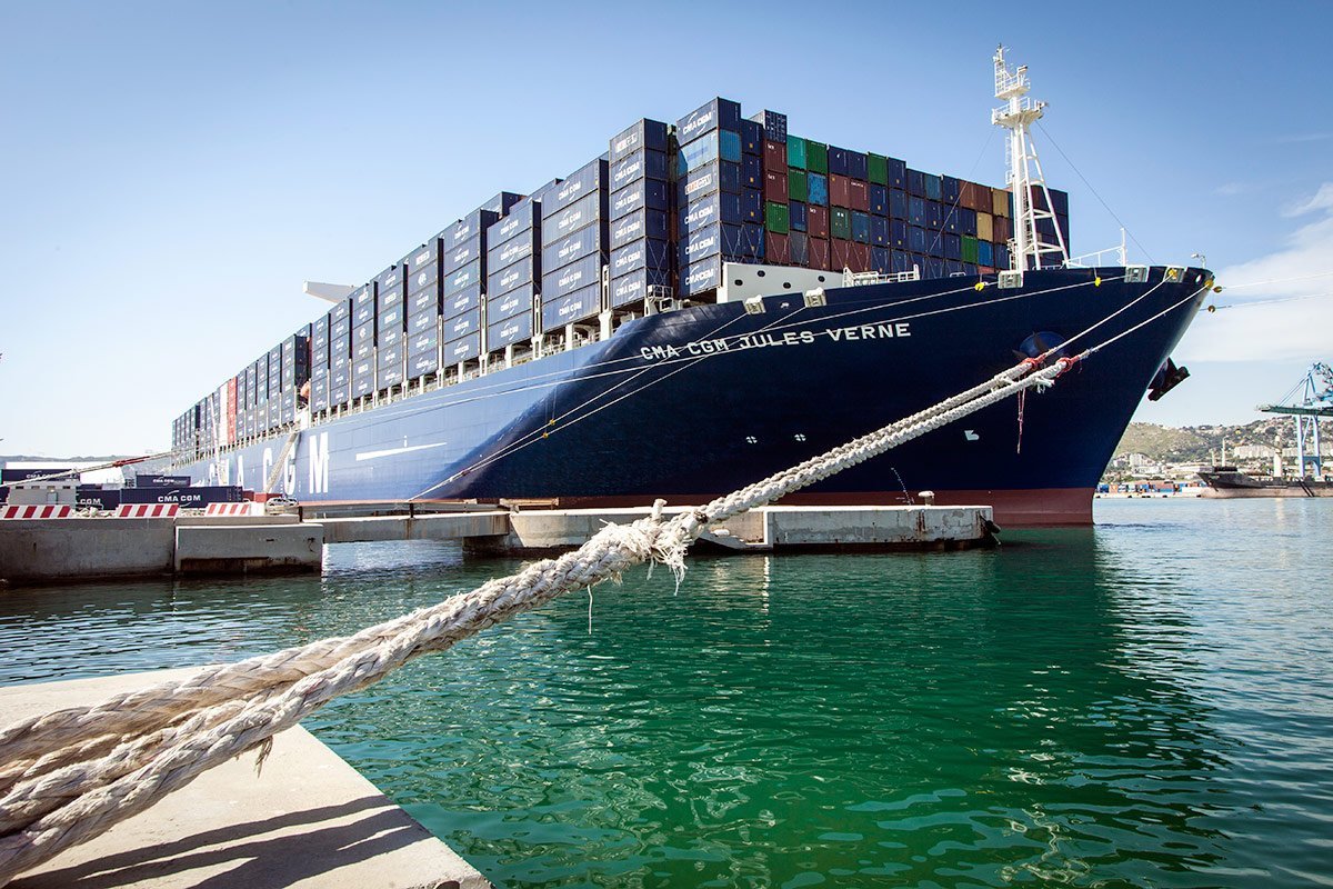 The biggest container ship named Jules Verne docked at the port of Marseilles photographed by corporate photographer Denis Dalmasso